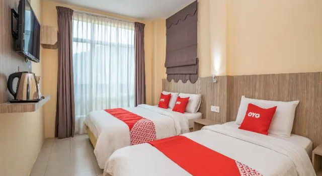 Трёхместный люкс OYO 44078 The Island Hotel