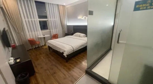 Номер Deluxe Mingdu Business Inn