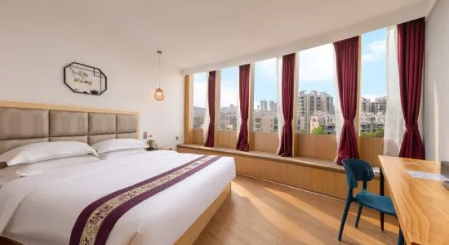 Люкс Man Quan Jia Hua Hotel