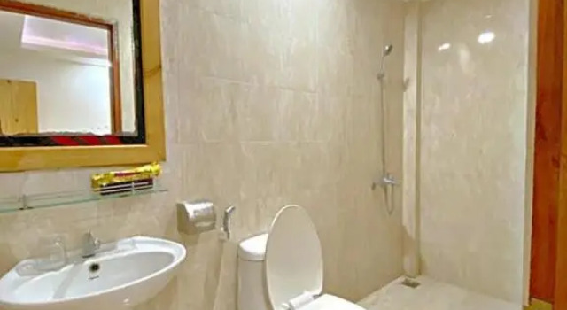 Кровать в общем номере Hotel Minh Hang