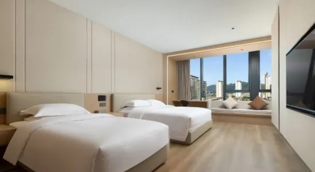 Семейный люкс Yongli Hotel (Pingyang Railway Station Branch)