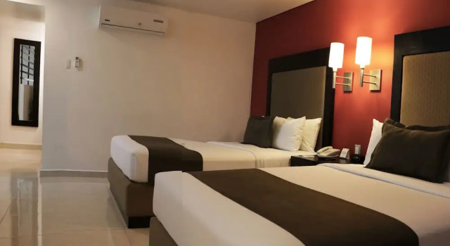 Четырёхместный номер Standard Hotel & Suites PF