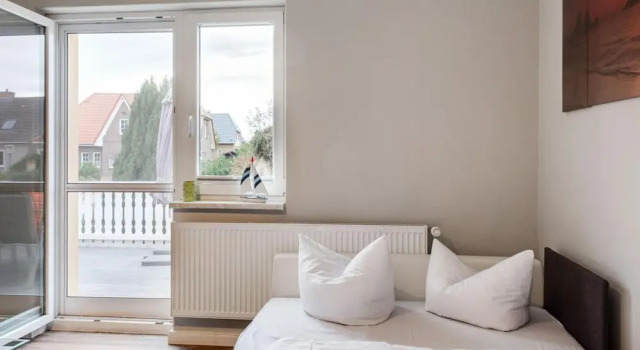 Апартаменты Snug Apartment in Kalkhorst with Terrace near City Center