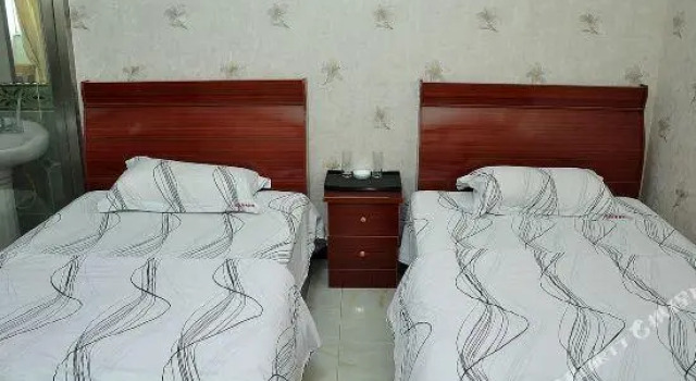 Yinan Shangjia Express Business Hotel, Reservar Hotel Yinan Shandong