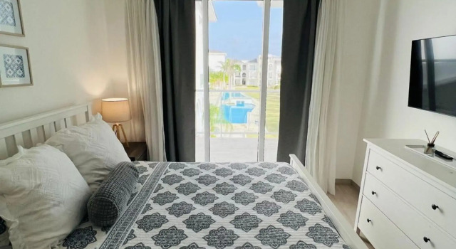 Cozy 1BDR with Pool Golf View at Cana Pearl, Забронировать Отель Баваро Пунта-Кана, рядом с Поле для гольфа Punta Blanca