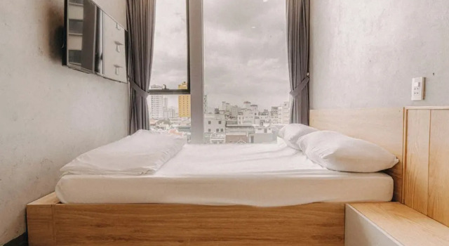 POSIKI Hotel & Dorm - Danang Dragon Bridge, Забронировать Отель Недорогие отели Дананга муниципалитета, рядом с Музей изящных искусств Дананга, недорого