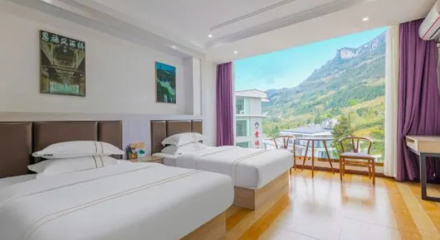 Xinhan Hotel, Забронировать Отель Энши Хубэй
