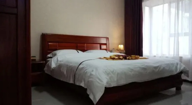 Люкс Deluxe с 2 комнатами Yashige Apartment Ruili