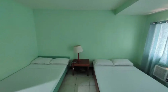 Люкс с балконом Green Ridge Apartelle
