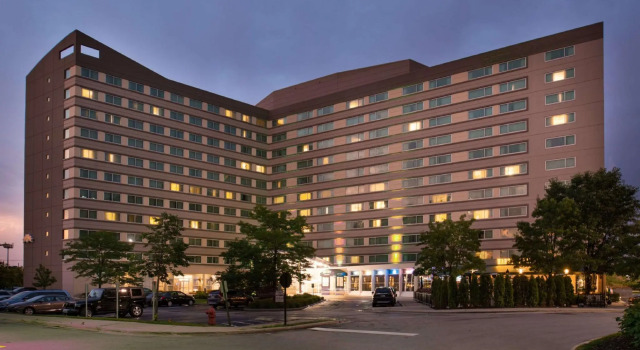 Кровать в общем номере Sonesta Chicago OHare Airport Rosemont