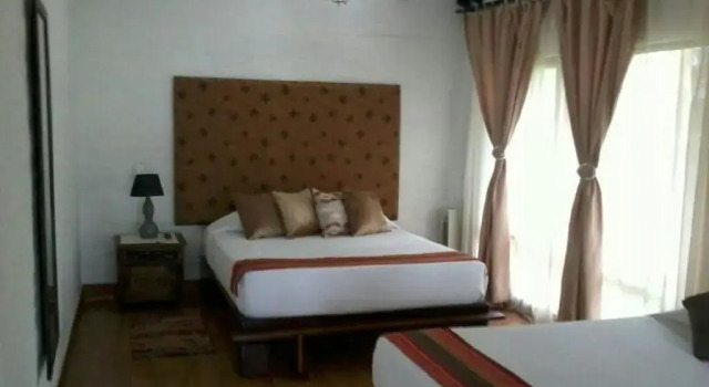Четырёхместный номер Standard Hotel Tata Premium