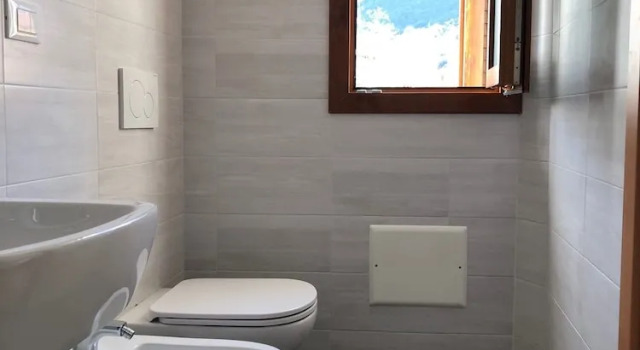 Bett im Wohnheim mit Gartenblick Ostello Trentapassi