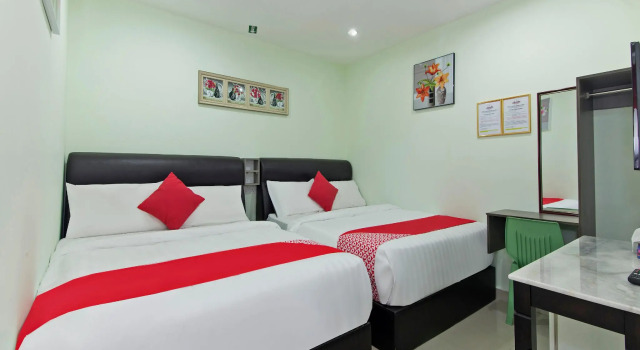 Семейный люкс OYO 444 KL Empire Hotel