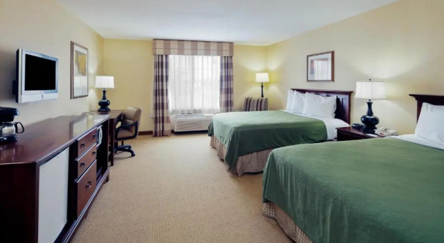 Четырёхместный номер Standard Country Inn & Suites by Radisson, Lima