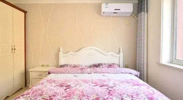 Семейный люкс с 3 комнатами с видом на море Yingkou Xileduo Seaview Apartment