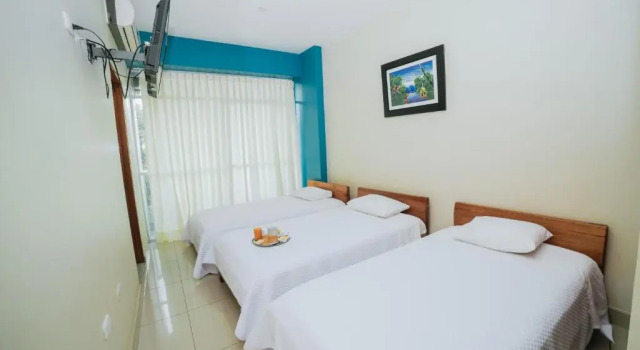Трёхместный номер Standard Hotel Suisui