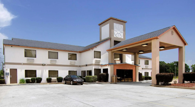 Кровать в общем номере Best Western Ville Platte