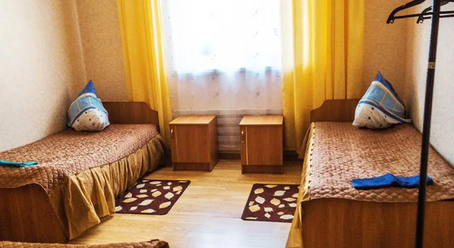 Кровать в общем номере Усадьба