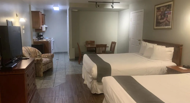 Четырёхместный семейный люкс Hotel and Suites Les Laurentides