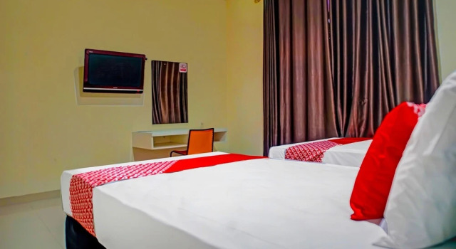 Hotel O Wisma Amrach, Prenota Hotel Watampone 