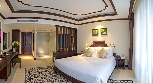 Номер Deluxe с балконом Grand Signature Resort Hoi An by M Village, a brand of Modern Village Lifestyle