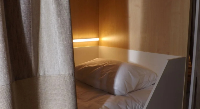 Letto in camerata seminterrato Holiday Hostel