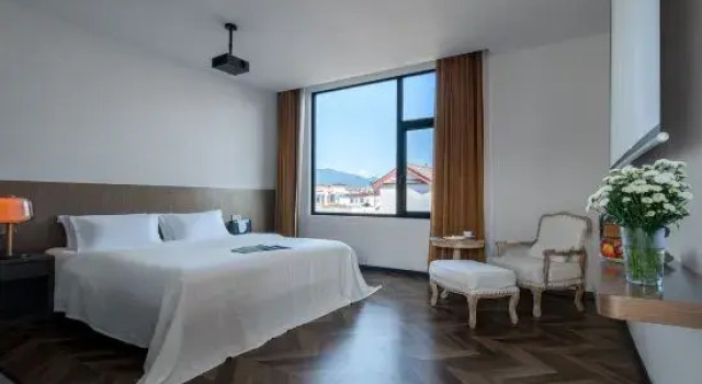 Семейный люкс с 2 комнатами Aixi Hotel in Lijiang Ancient Town (Mufu Branch)