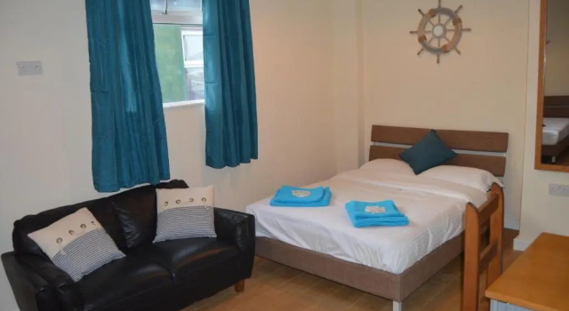 Апартаменты Deluxe Central Cove Guesthouse