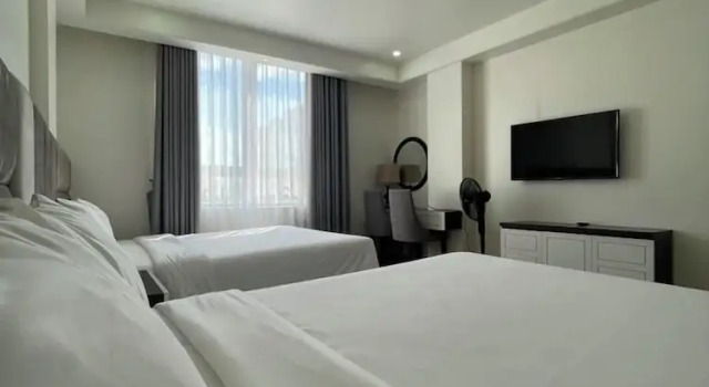 Четырёхместный номер Deluxe Lotus Hotel & Apartment