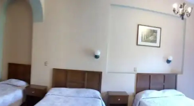 Кровать в общем номере Hotel La Casona del Vizconde