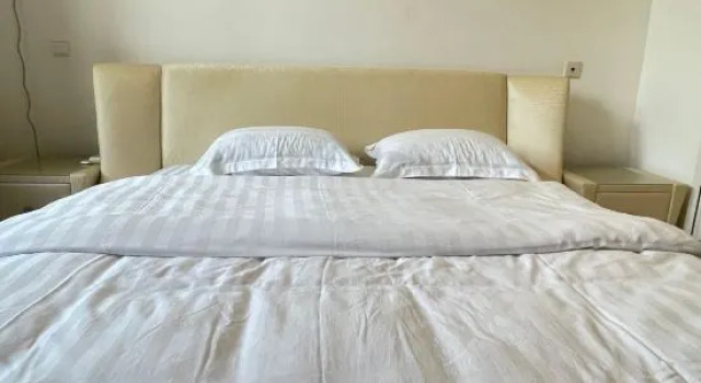 Кровать в общем номере Mariolio Homestay (Dalian Golden Pebble Beach)