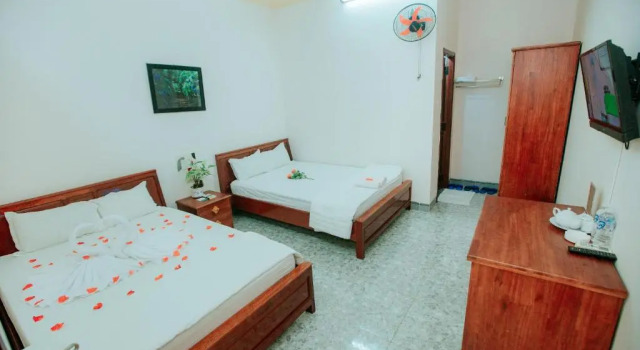 Четырёхместный номер Standard Nhà Nghỉ Kim Lài - Đối diện bệnh viện tỉnh Gia Lai -132 Tôn Thất Tùng