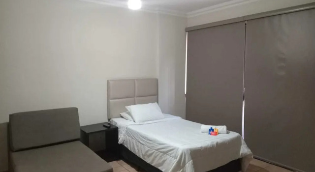 Трёхместный номер Deluxe Plaza Inn Flat Araxá