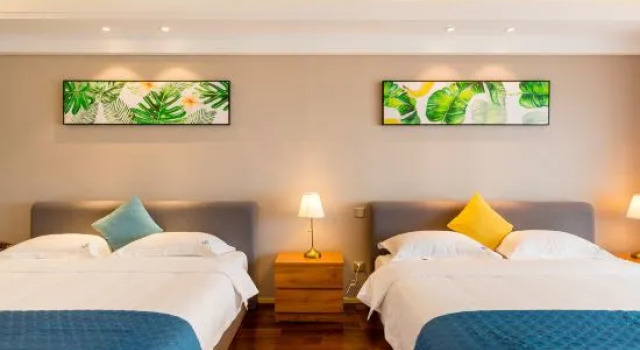Кровать в общем номере с видом на море Zhanyou Home Sea View Apartment Hotel(Dalian Venice the City of Water)