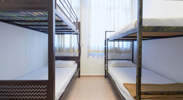 Bett im Wohnheim G99 Hotel