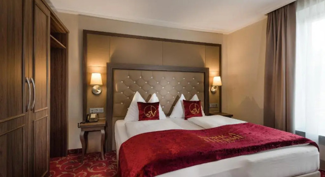 Двухместный номер с балконом Hotel Norica - Thermenhotels Gastein mit dem Bademantel direkt in die Therme
