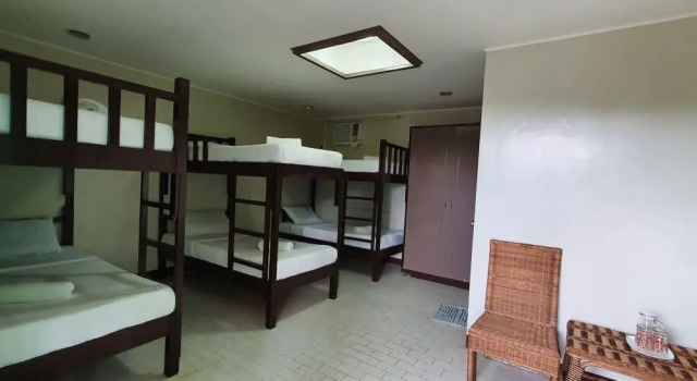 Кровать в общем номере Caliraya Ecoville Recreation and Farm Resort