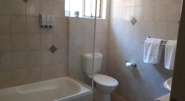 Апартаменты Country Gardens Motor Inn