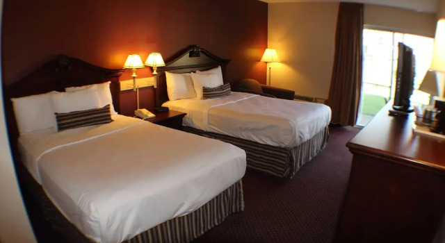Четырёхместный номер Standard с красивым видом из окна The Garden Inn