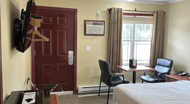 Номер Comfort Travellers Inn