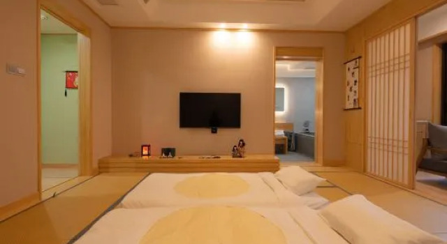 Кровать в общем номере Mogan Bamboo Pavilion Private Soup B&B