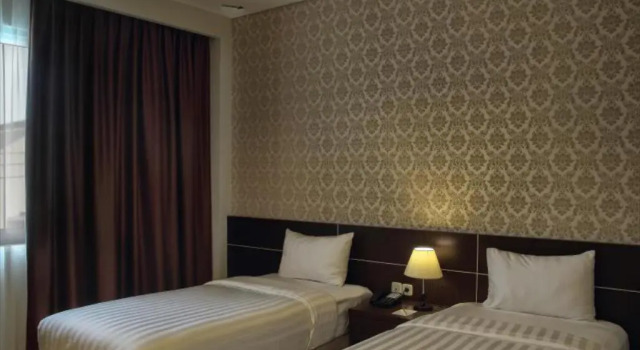 Номер Deluxe Asoka Luxury Hotel