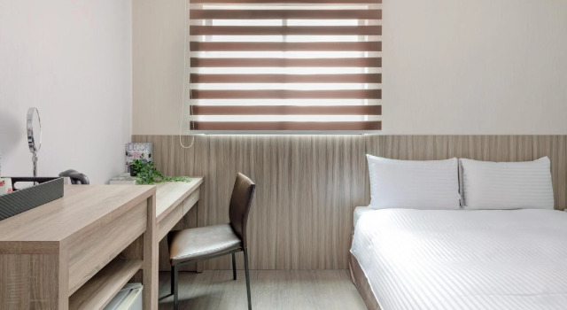 Кровать в общем номере Hotel Brown - Chihkan Branch