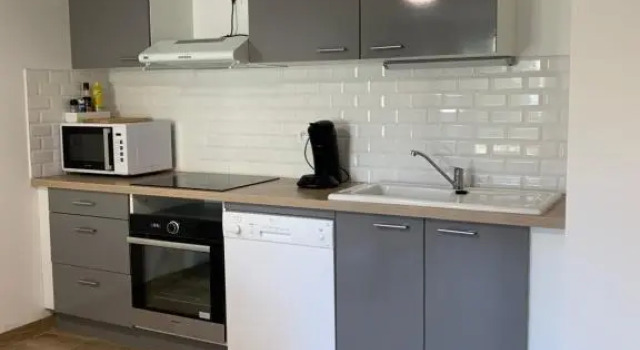 Апартаменты с 2 комнатами Appartement, centre ville AIGUILLON