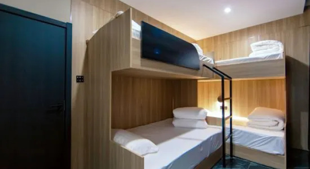 Кровать в общем номере Enjoy E-sports Hotel (Jinrong Building Materials City Store)