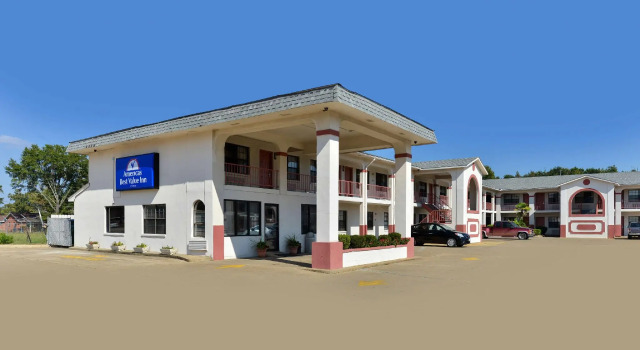 Кровать в общем номере Americas Best Value Inn