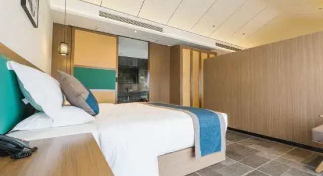 Семейный люкс Executive с 2 комнатами Songfengju Courtyard Hotel (Xingyi Wanfenglin Airport & High-speed Railway Station Branch)