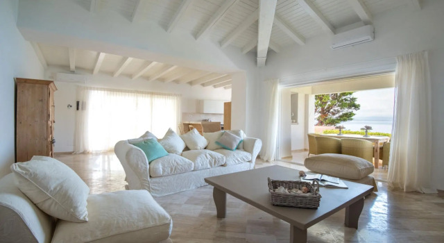 It features a large living area with fully equipped open kitchen and access to the covered terrace d-S'ABBA 1
