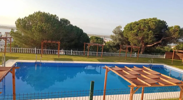 APARTAMENTO EN ROMPIDO con piscina, chiringuito y pistas, Забронировать Апартаменты/квартира Картая Муниципалитет Уэльва