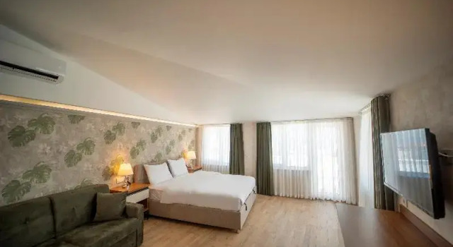 Номер Deluxe MELL City Suites Hotel
